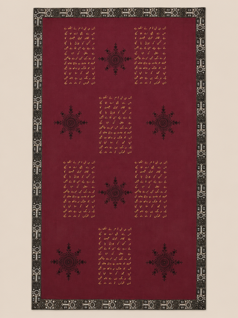 Maroon handloom pashmina shawl with hand-printed Nastaliq calligraphy tribute to Jaun Elia, shown in flat-lay.